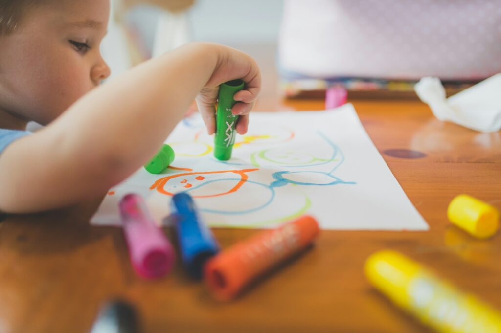 Toddler enjoying coloring